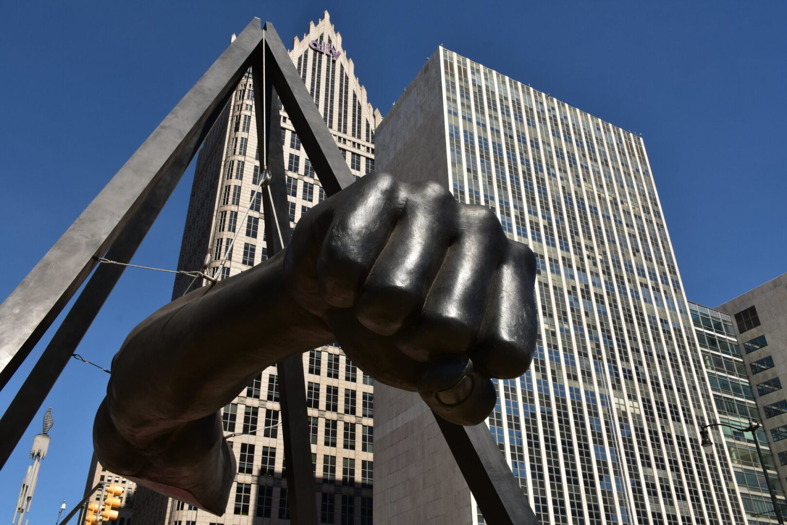 A close up of the fist on a statue